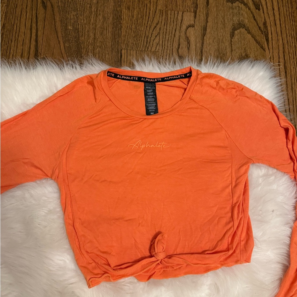 Alphalete Women's Vibrant Orange Long Sleeve Tee